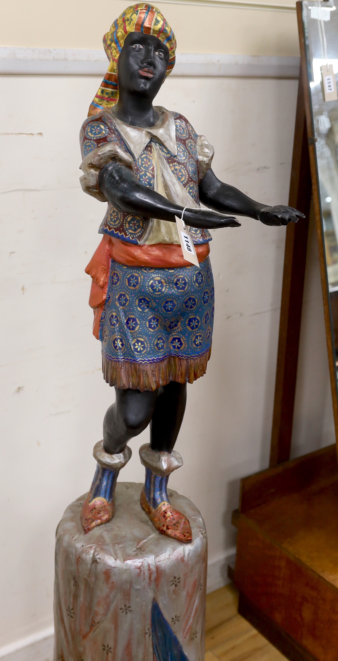 A painted composition Blackamoor waiter, lacking tray, height 142cm